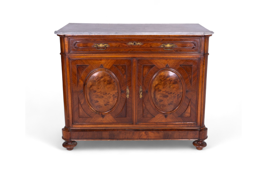 Ancient chest of drawers with marble shelf